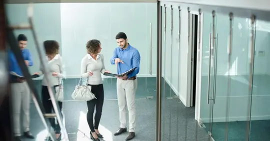 business woman inquiring about a commercial space