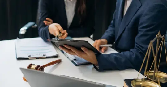 business owner with a lawyer